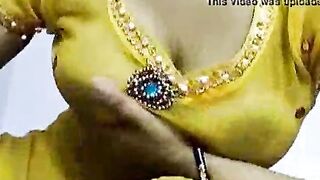 Sexy village girl squeezing her tits