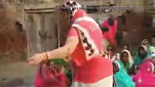 The village woman is dancing showing off her tits